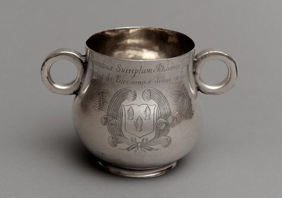 Cup with large belly and thick cast rim base, and a pair of ox-eye handles, 1675 by English School