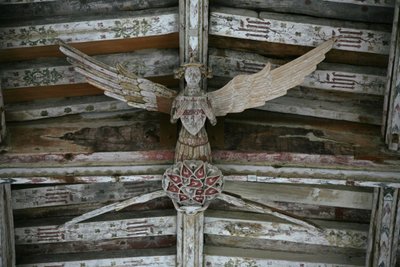 View of one of the carved wooden angels in the nave by English School