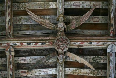 View of one of the carved wooden angels in the nave by English School