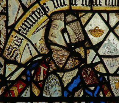 Detail from a window depicting the donor (detail) by English School