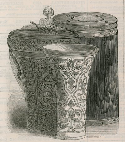 Drinking vessels: The Luck of Eden Hall, with leather case for same, and a peg tankard of wood by English School