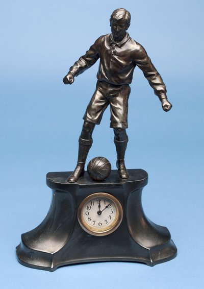 Footballer, part of a clock set by English School