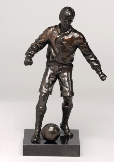 Footballer, part of a clock set by English School