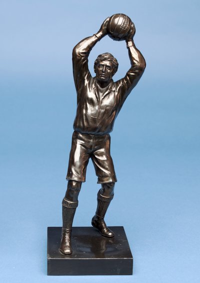 Footballer, part of a clock set by English School
