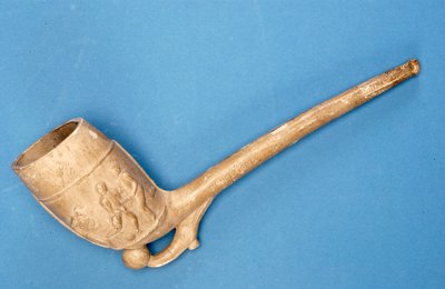 Pipe with raised design of football and rugby (clay) by English School