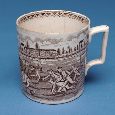 Staffordshire pint mug with sepia transfer of a football match (ceramic) by English School