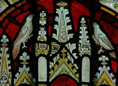 The East window depicting a canopy with birds by English School