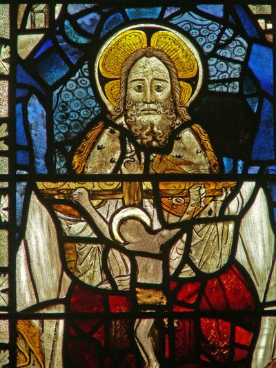 The East window depicting a composite panel of the Trinity by English School