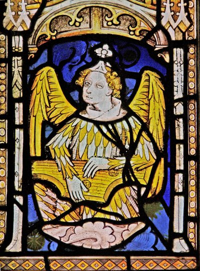 The East window depicting a musician angel with zither by English School