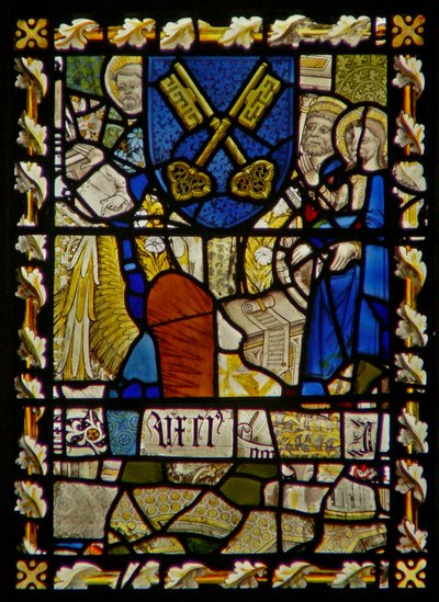 The east window depicting St John, St Peter at the Gate, shield with a symbol of St Peter by English School