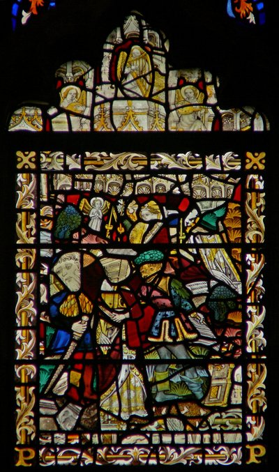 The east window depicting St John on Patmos; angel musicians in the canopy by English School