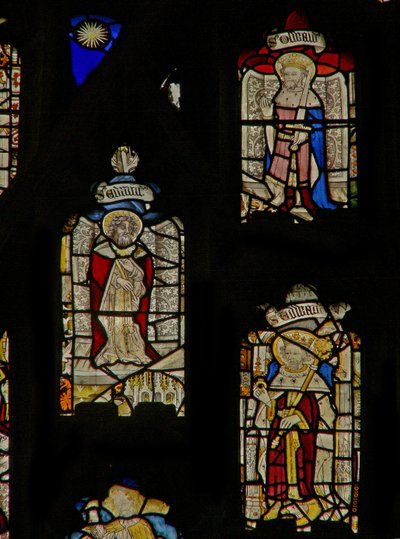 The east window depicting St Oswald, St Edmund and St Edward the Confessor by English School