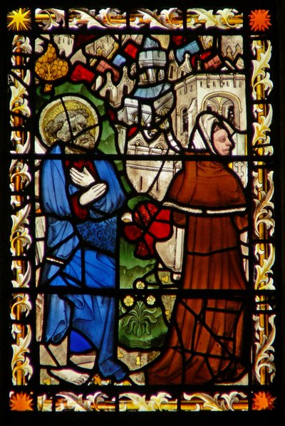 The east window depicting St Peter and Simon Magus by English School