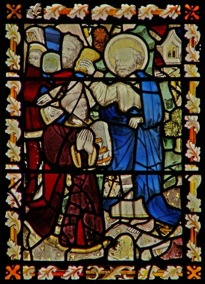 The east window depicting St Peter baptising a young man by English School