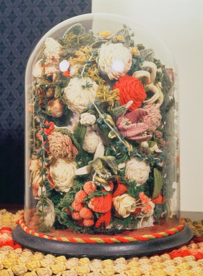 Victorian woollen flowers in a glass case by English School