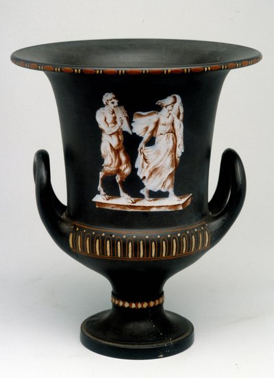 Wedgwood vase depicting a young girl and a black ceramic satyr painted 