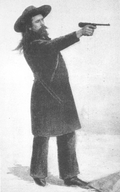 William F. Cody (Buffalo Bill) with his new gun by English School