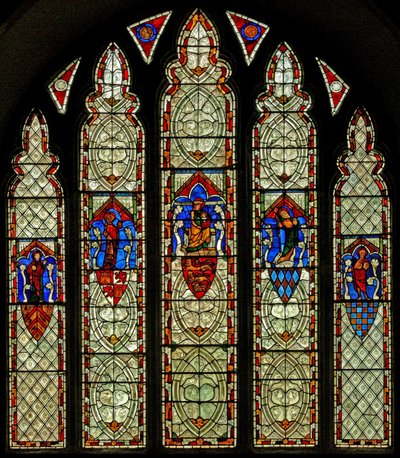 Window Ew depicting the Crucifixion and St Mary, St John, St Mary Magdalene and St Margaret by English School