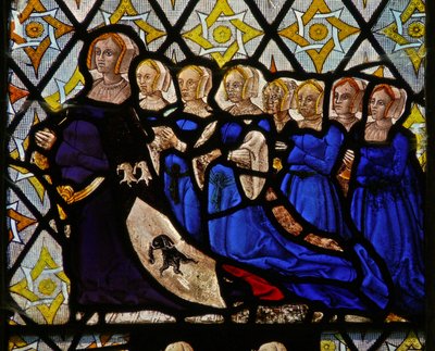 Window depicting Isobel Saunders, wife of Walter Curson and their seven daughters by English School