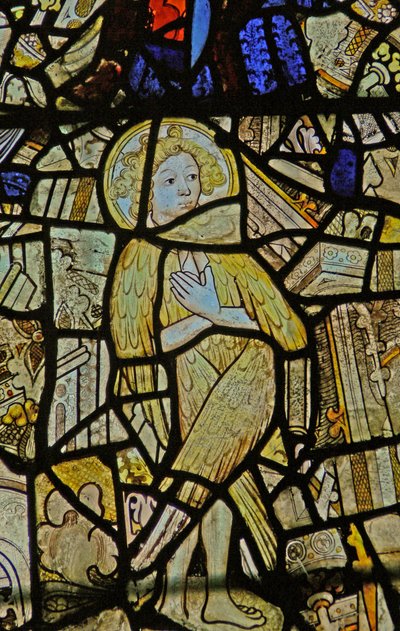 Window depicting a composite feathered cherubim or seraphim by English School