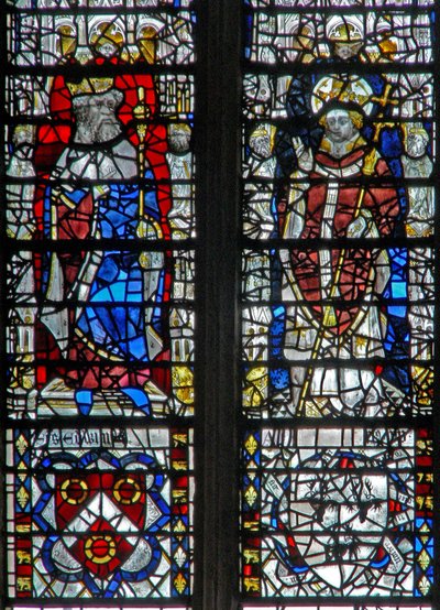 Window depicting figures and shields below by English School