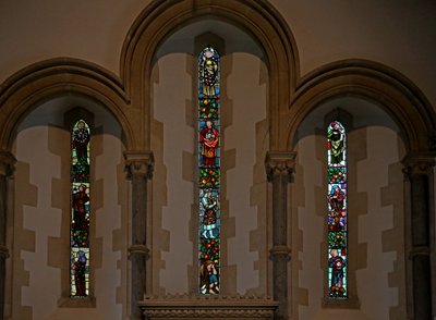 Window depicting the east window with lancets by Fred Weekes and Gualbert Saunders by English School