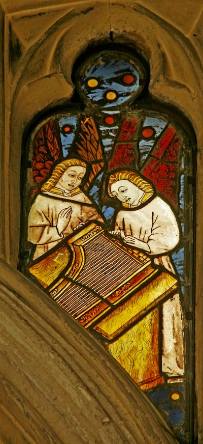 Window depicting musician angels with a clavicymbal by English School