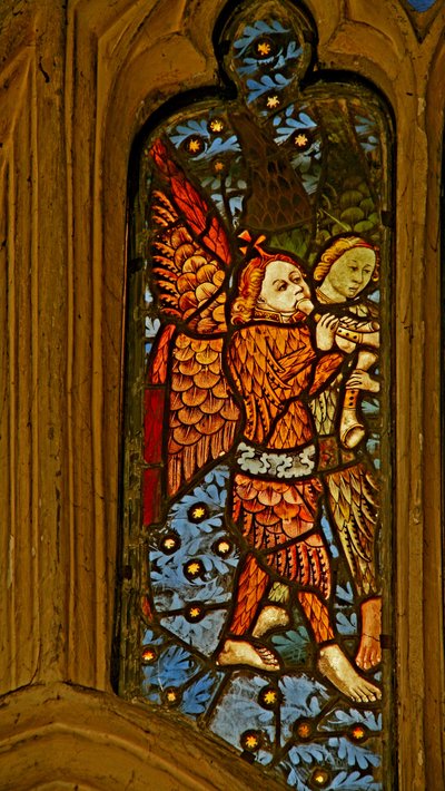 Window depicting musician angels with pibcorns by English School