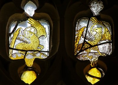Window depicting Evangelists symbols - St Luke