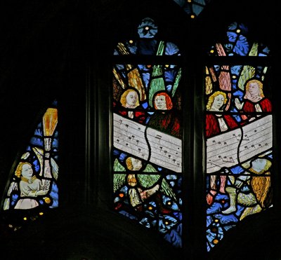 Window depicting the angelic choir singing; angel censing by English School