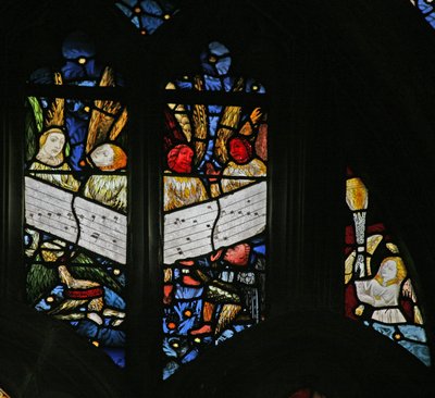 Window depicting the angelic choir singing; angel censing by English School