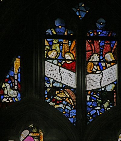 Window depicting the angelic choir singing; angel censing by English School