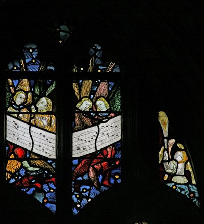 Window depicting the angelic choir singing; angel censing by English School