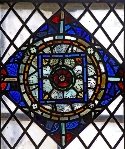 Window s4 depicting a reset geometric panel by English School