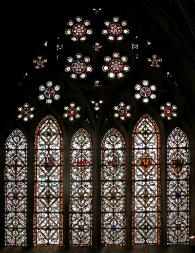 Window s5 depicting geometric grisaille and roundels in the tracery lights by English School