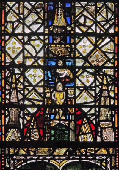 Window w31 depicting a canopy with a figure by English School