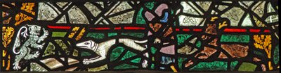 Window w40 depicting a border panel with stag, dog and lion by English School