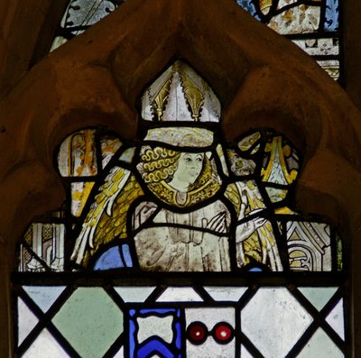 Window w7 depicting an angel by English School