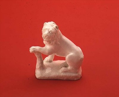 Bow white figure of a lion, seated looking to the left, c.1750 by English School English School