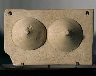 Votive plaque showing two breasts by Erich Lessing