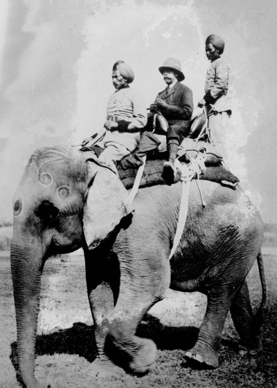 George V, King of Great Britain, riding on an elephant on a hunting trip in Nepal, December 1911 by Ernest Brooks