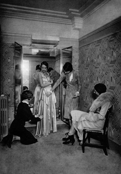 Trying on a Dress at a Great Dressmakers, Paris by Ernest Flammarion