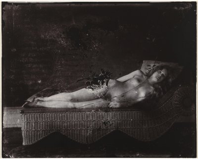 Female Nude on a Chaise Longue by Ernest James Bellocq