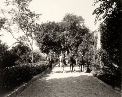 A group of uniformed men on horseback at the farm Lo Zucco, Sicily by Eugenio Interguglielmi