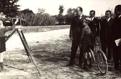 Mussolini Posing with His Son for a Photographer by Eugenio Risi