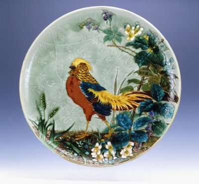 A large Emile Diffloth glazed earthenware charger, depicting a Golden Pheasant by Eugène Carrière