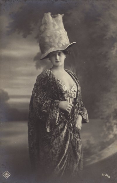 Attractive young woman, wearing a strange hat by European Photographer