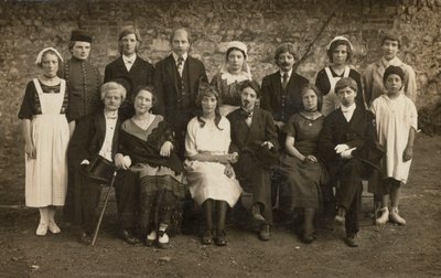 Group portrait of young people in costume by European Photographer