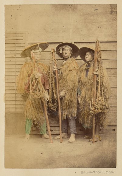 Three Japanese Men in Grass Robes and Wide-Brimmed Hats by Felice Beato