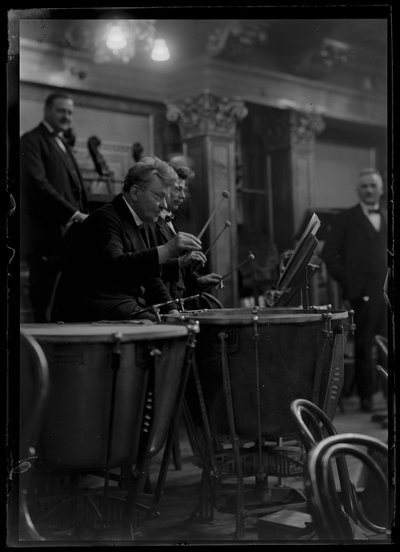 Striking mechanism of the Viennese member of a philharmonic orchestra by Ferdinand Schmutzer